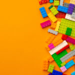 kids toy constructor details scattered on yellow b rtxqfq4