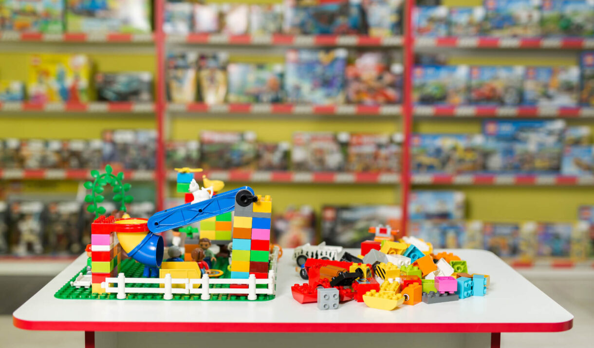 plastic toy blocks on the white table in the store c76anvx